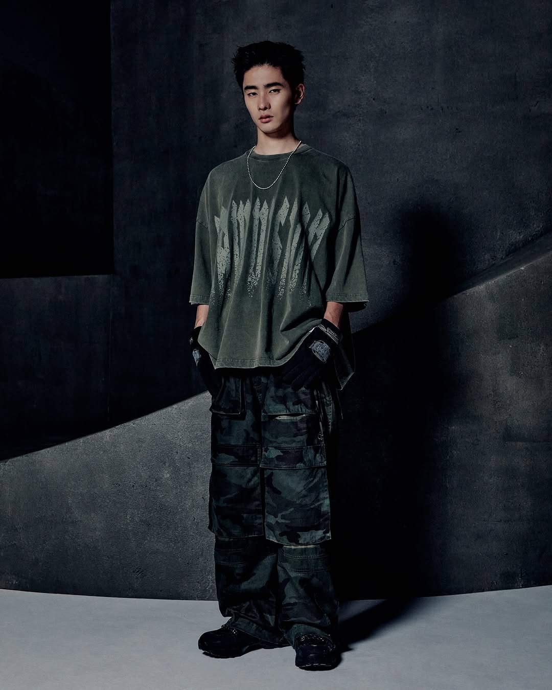 Photo by NOMANUAL® on August 04, 2025. May be an image of 1 person, parka, military uniform, sportswear and text.