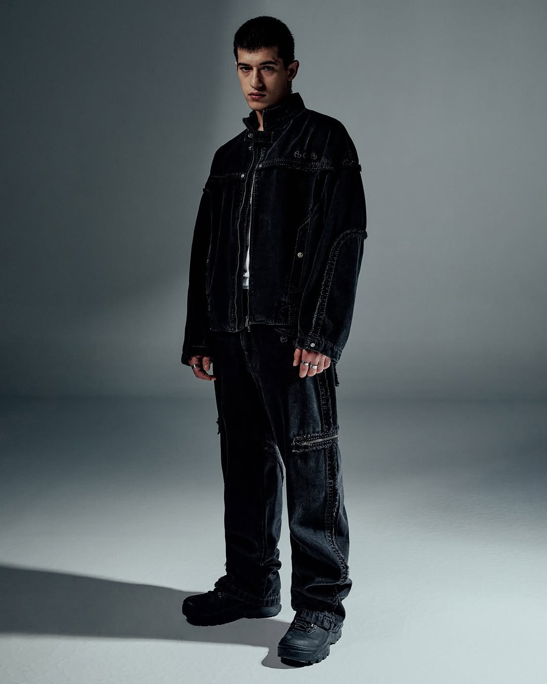 Photo shared by NOMANUAL® on September 16, 2025 tagging @nomanual.designs, and @truereligion.kor. May be an image of one or more people, outerwear and text.