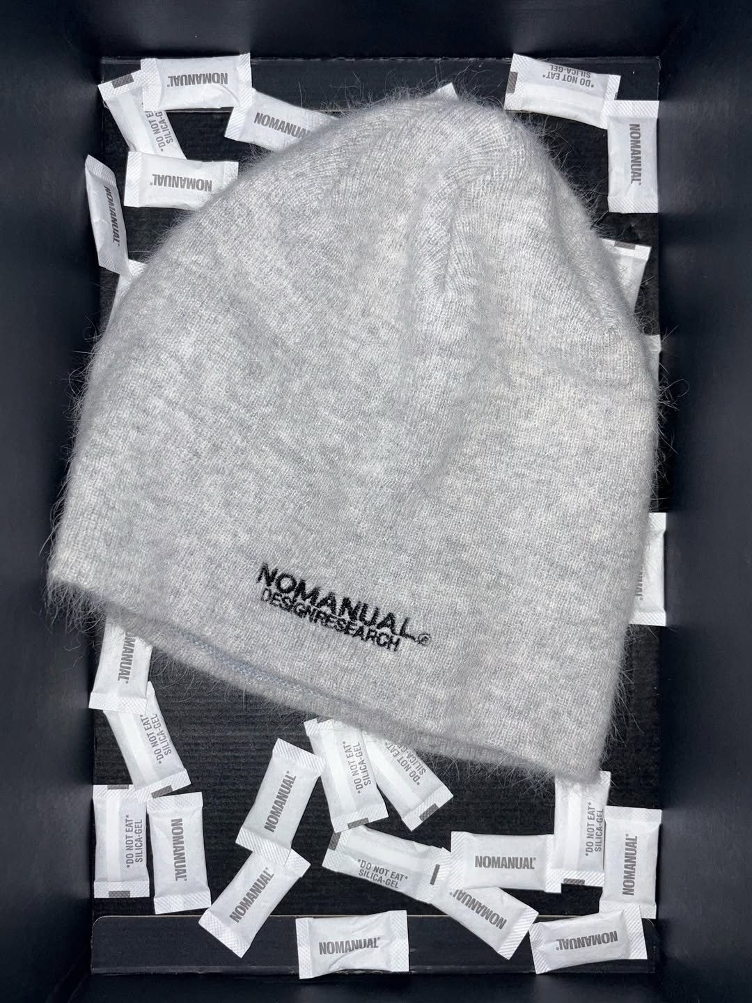 Photo by NOMANUAL® on January 14, 2026. May be an image of hat, wool and text.