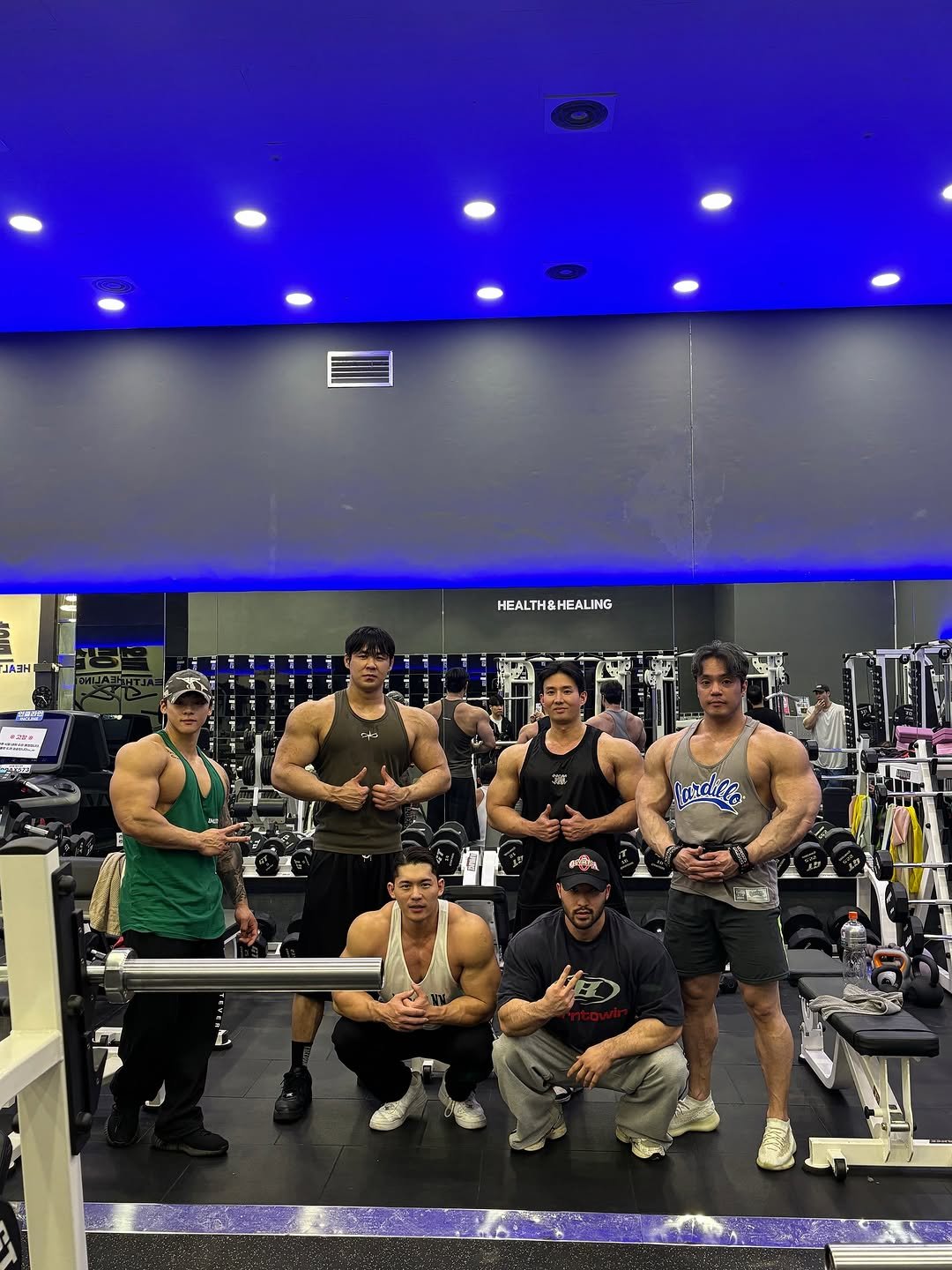 Photo shared by TEAM SHAPER on January 31, 2026 tagging @non_nan_p, @hongdaekwon, @k.d___y___, @shaperxstone, @yejiho92, and @4xsize_190. May be an image of one or more people, biceps, people bodybuilding, activewear and text.