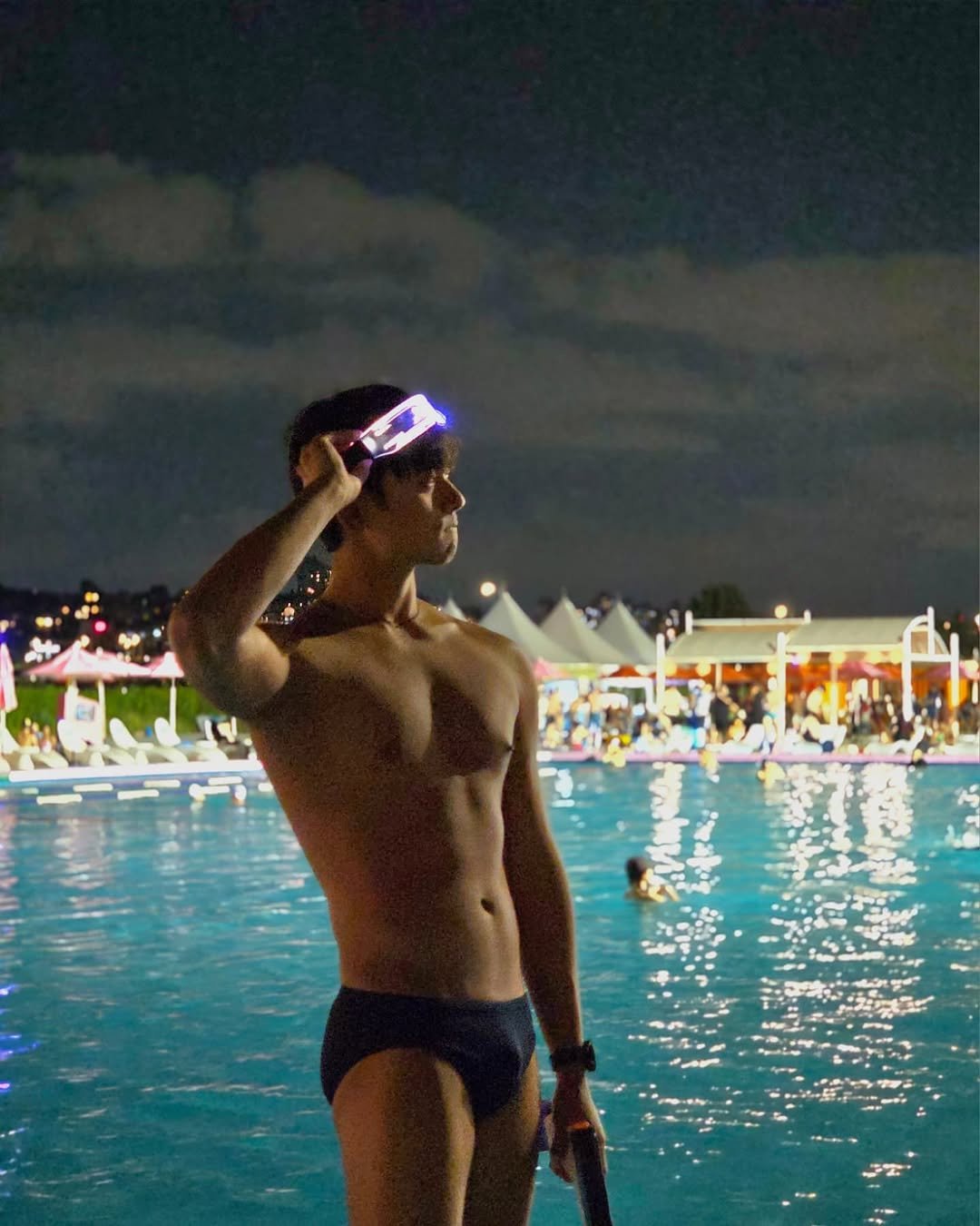 Photo by 𝗝𝗮𝗲𝗦𝘂𝗻𝗴_𝗛𝘆𝘂𝗻 on August 28, 2025. May be an image of 2 people, people swimming, glasses, pool, cabana and text.