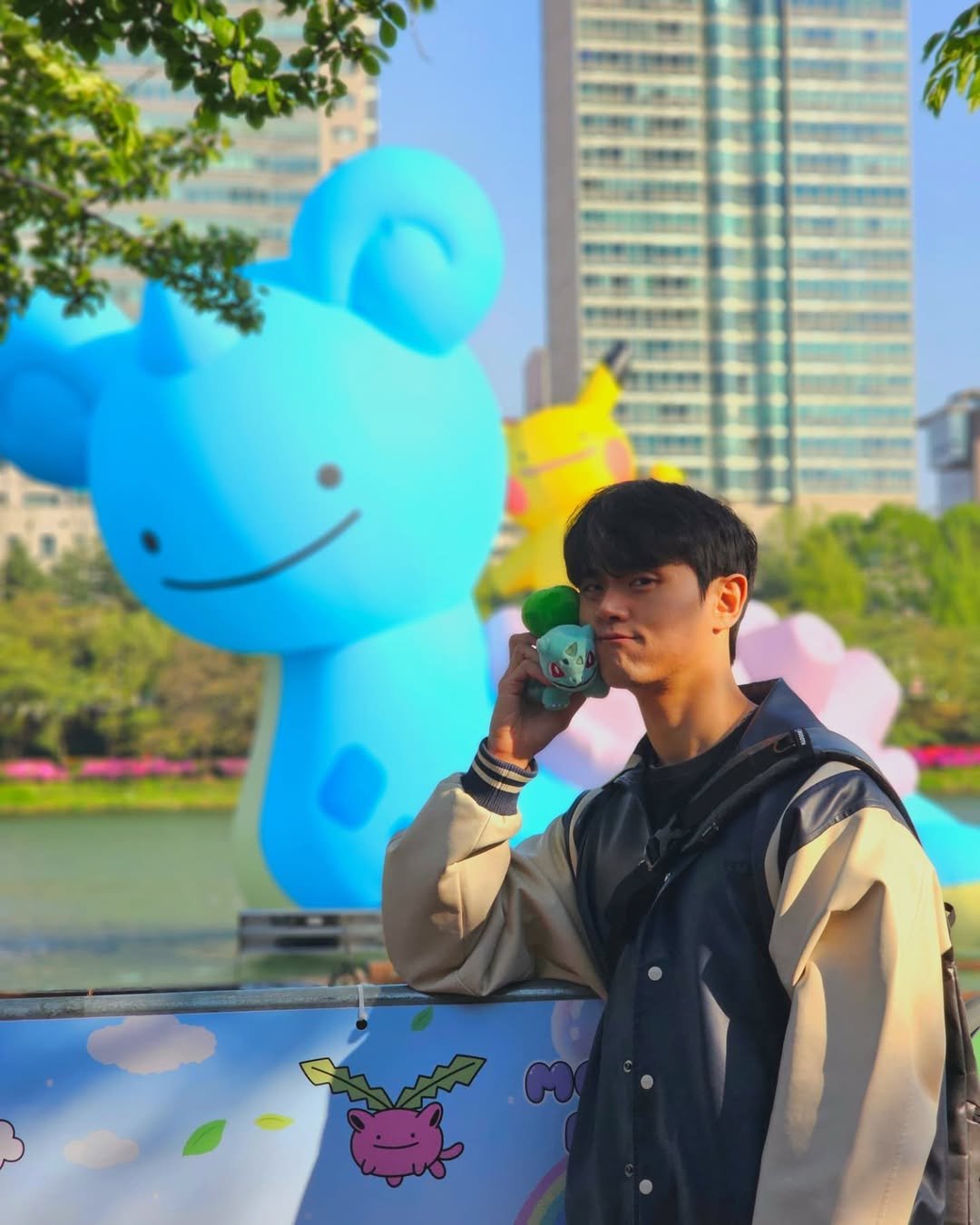 Photo shared by 𝗝𝗮𝗲𝗦𝘂𝗻𝗴_𝗛𝘆𝘂𝗻 on April 28, 2025 tagging @pokemon_korea_official, and @metamong._.project. May be an image of 1 person, cornflower, outdoors and text.