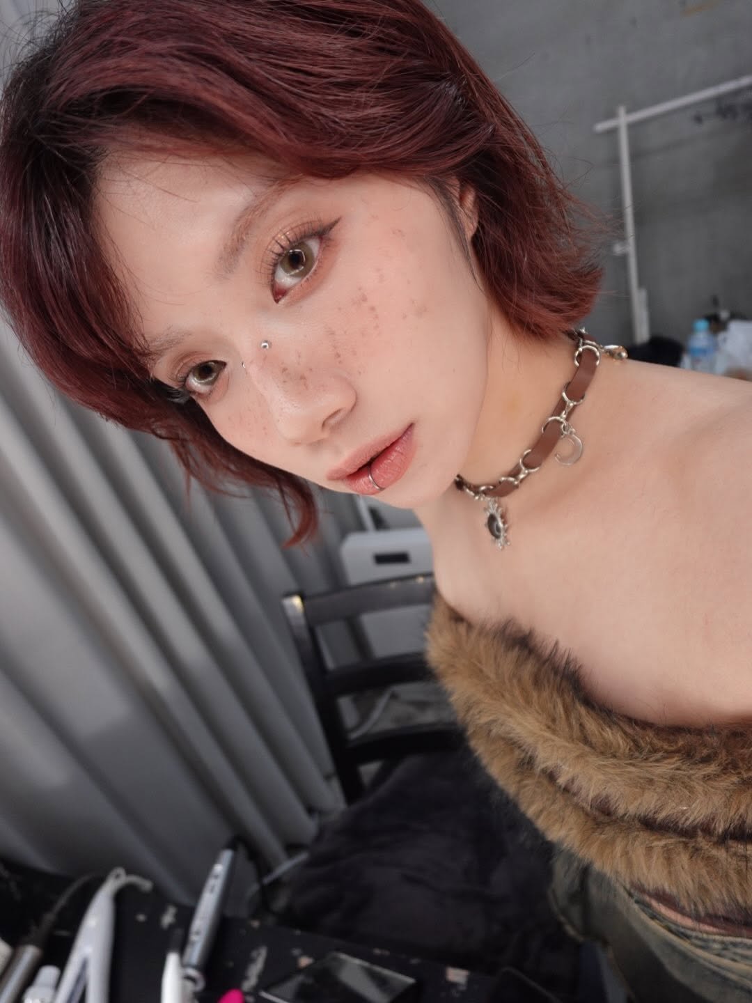 Photo by 石原　希望(いしはら　のぞみ) on April 12, 2026. May be a closeup of one or more people, braids, makeup, choker and text.