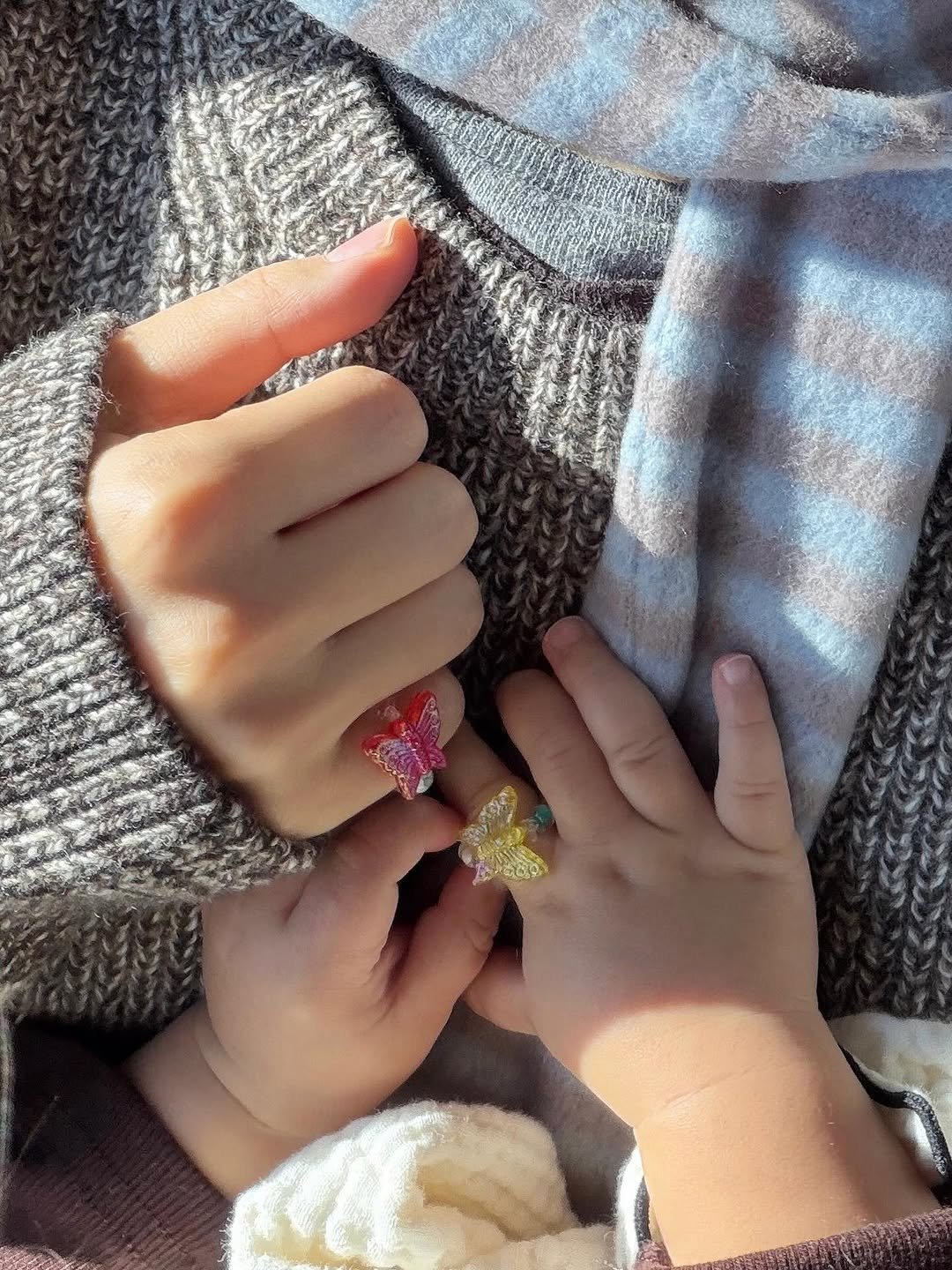 Photo shared by Ga Young on December 30, 2025 tagging @nugayoung, and @nutaenee. May be an image of baby, ring and text.