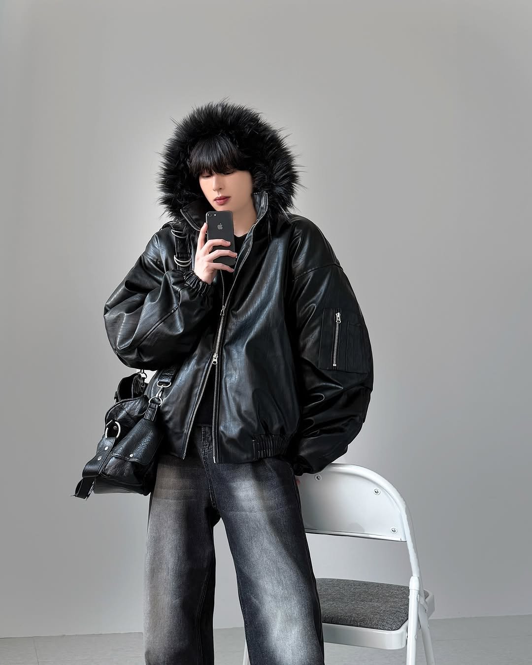 Photo by 영재/유어너스 on November 12, 2025. May be an image of leather, fur coat, jacket, parka and text.