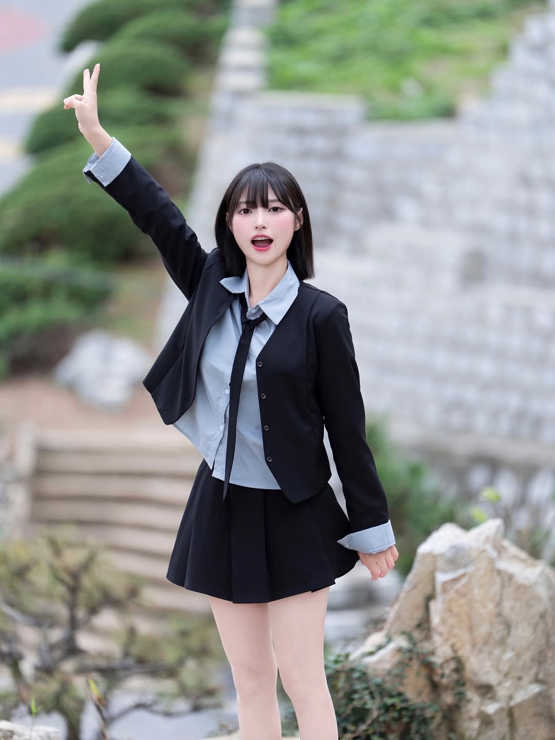 Photo by 박다혜 on December 08, 2025. May be an image of suit, miniskirt and text.