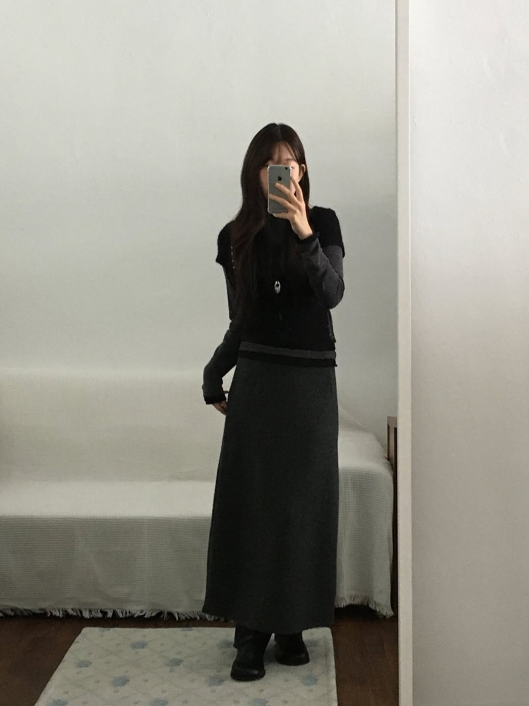 Photo by 오베럴 | obetter on November 30, 2025. May be an image of cardigan and text.