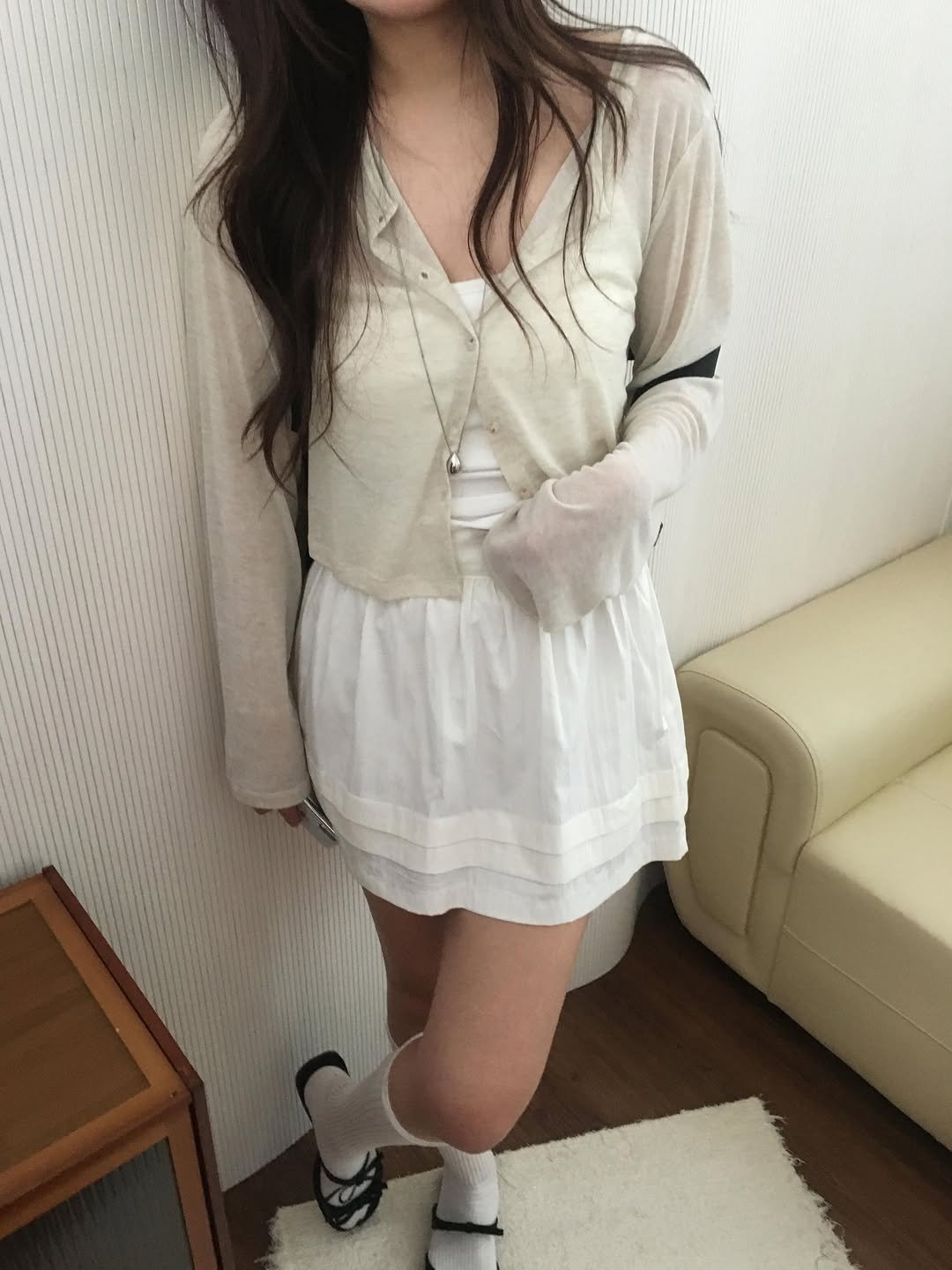 Photo by 오베럴 | obetter on April 27, 2026. May be an image of sleepwear, bath robe, dress and text.