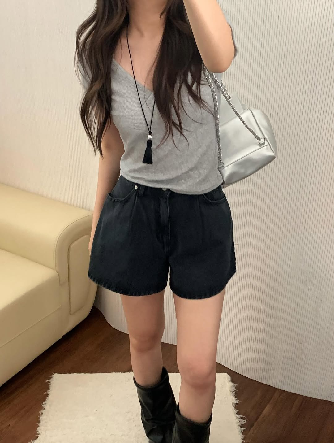 Photo by 오베럴 | obetter on April 27, 2026. May be an image of shorts, top, miniskirt and text.