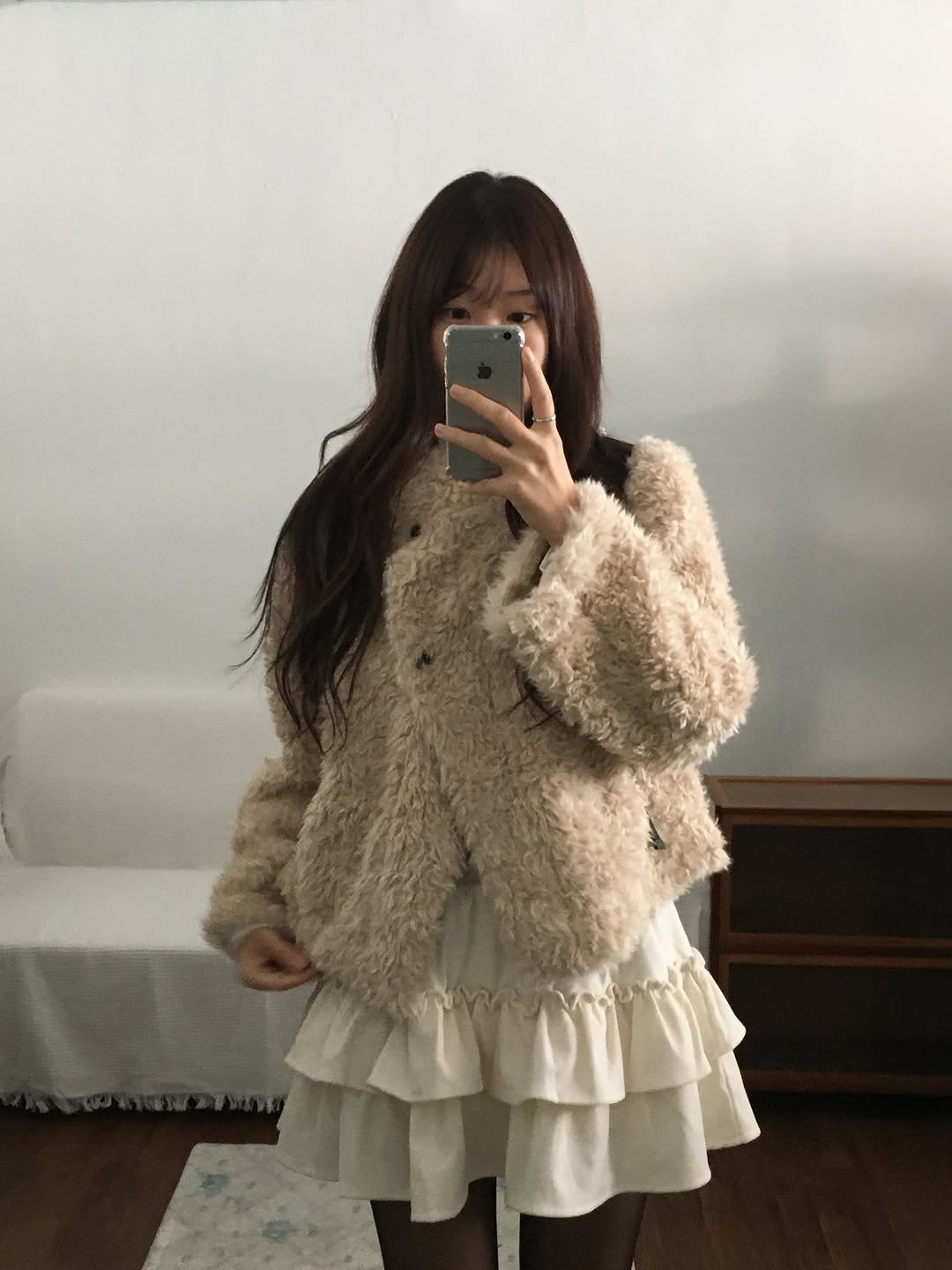 Photo by 오베럴 | obetter on November 16, 2025. May be an image of duffle coat, miniskirt, parka and text.