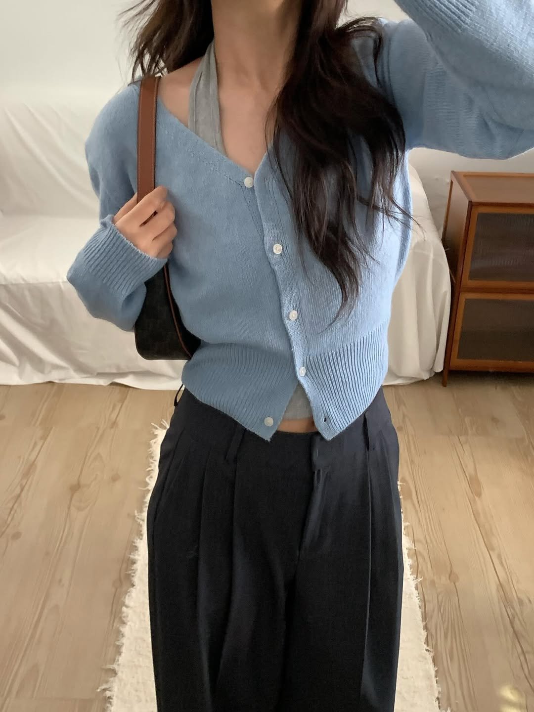 Photo by 오베럴 | obetter on February 22, 2026. May be an image of cardigan, top and text.