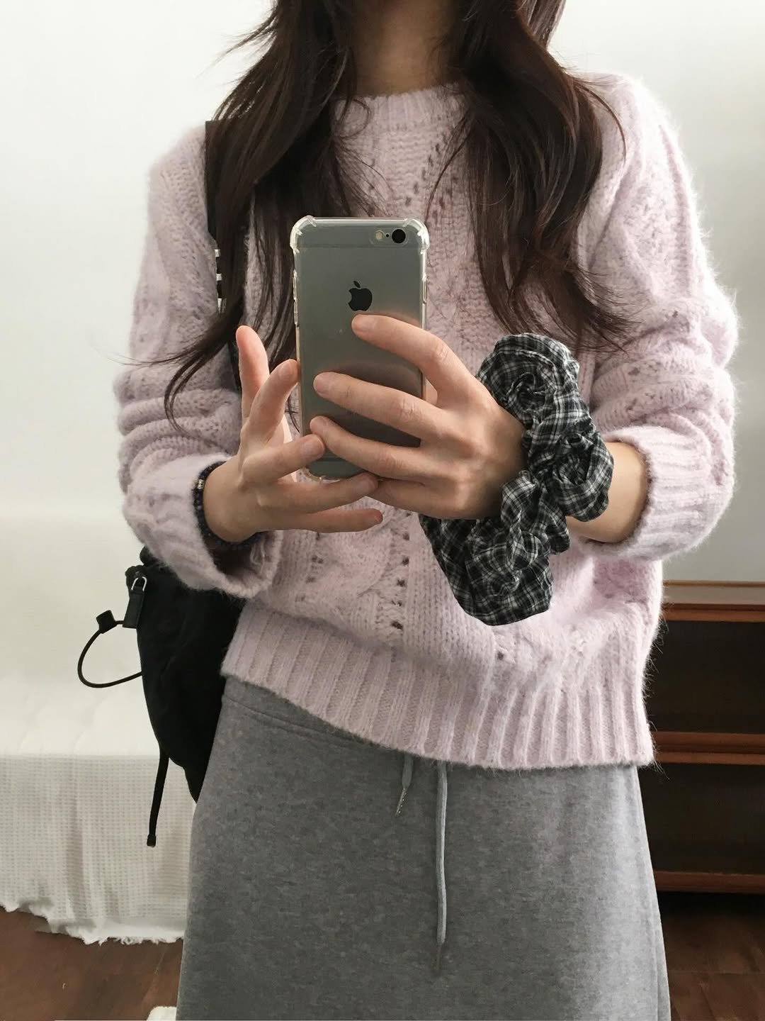 Photo by 오베럴 | obetter on January 05, 2026. May be an image of sweater, cardigan, knit, parka and text.