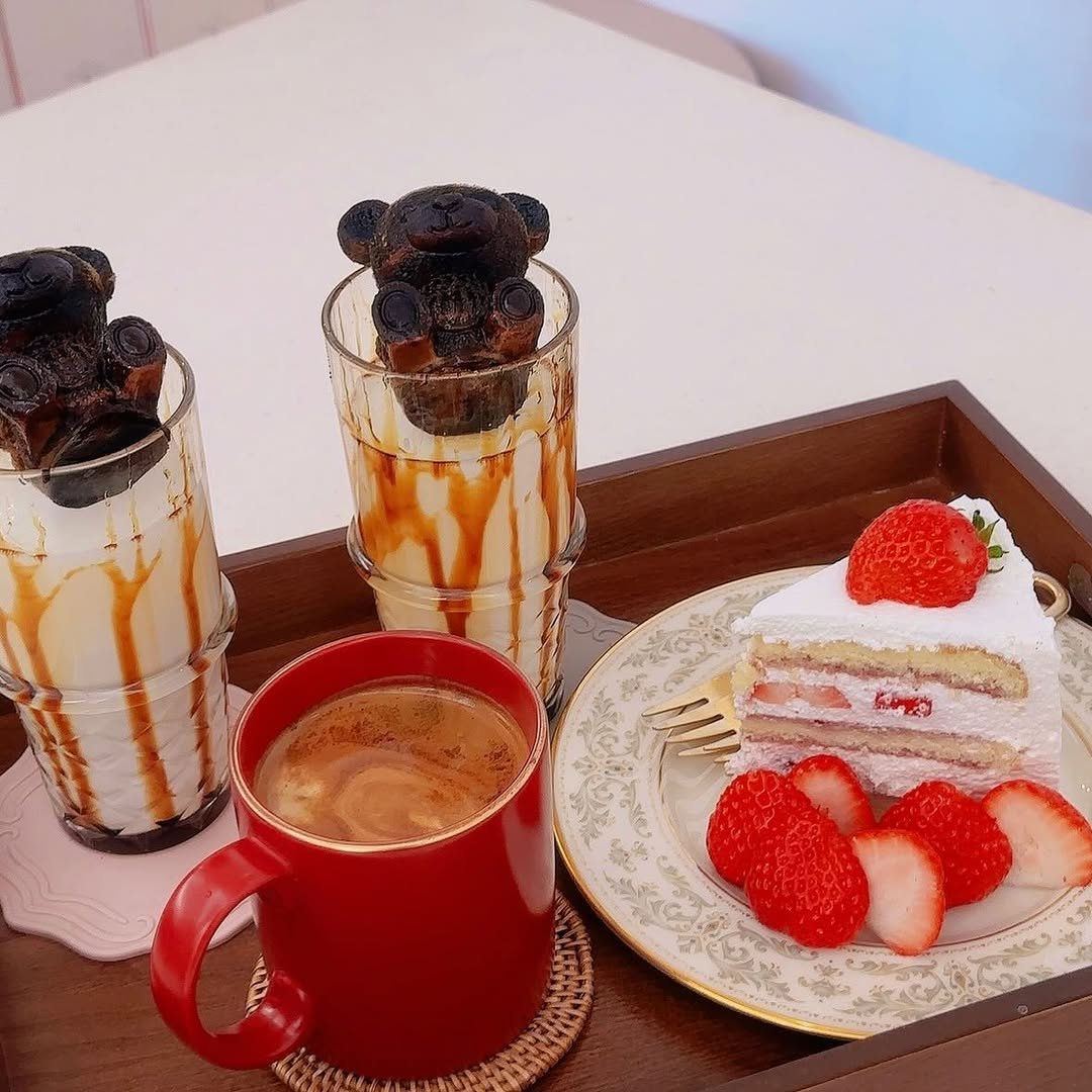 Photo by OF Oui 오브위 on April 02, 2026. May be an image of coffee cup, strawberry, coffee, chiffon cake, whipped cream, chocolate cake and text.