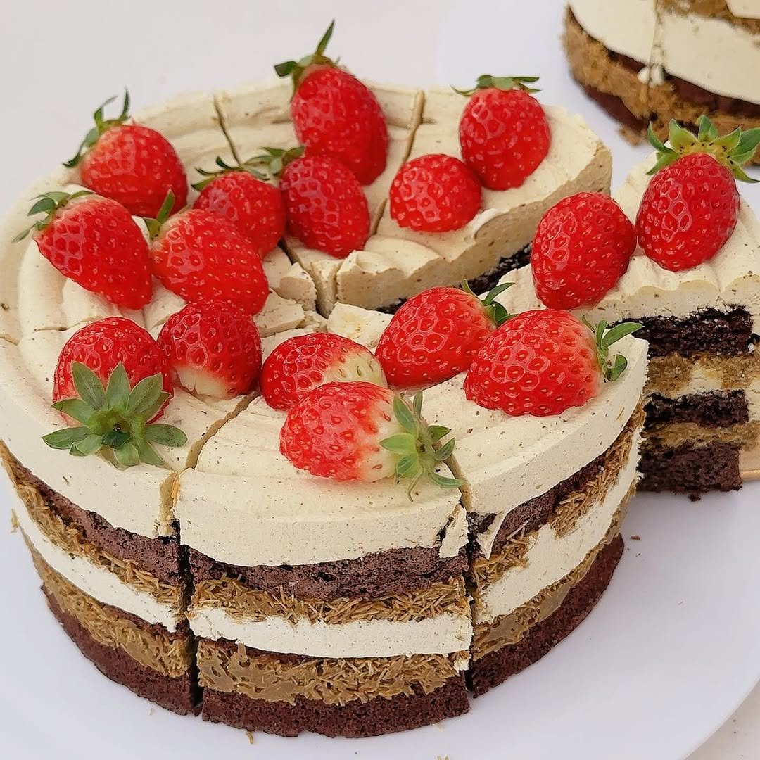 Photo by OF Oui 오브위 on February 05, 2026. May be an image of strawberry, chocolate mousse, fruitcake, chocolate cake, tiramisu and text.