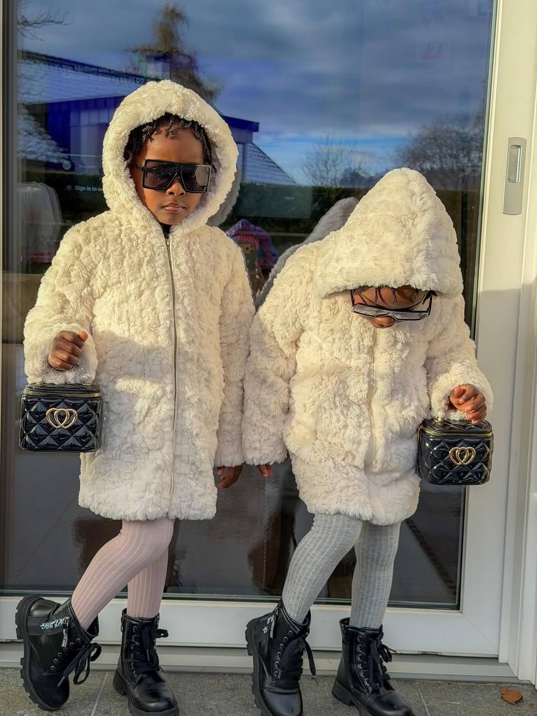 Photo by 🎀Kendra & Kimberly🎀 on December 02, 2025. May be an image of child, sherpa coat, fur coat, snowsuit, parka and text.