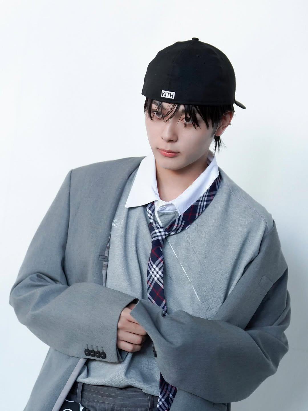 Photo by 유선호 YOO SEONHO on December 30, 2025. May be an image of one or more people, bangs, duffle coat and bolo tie.