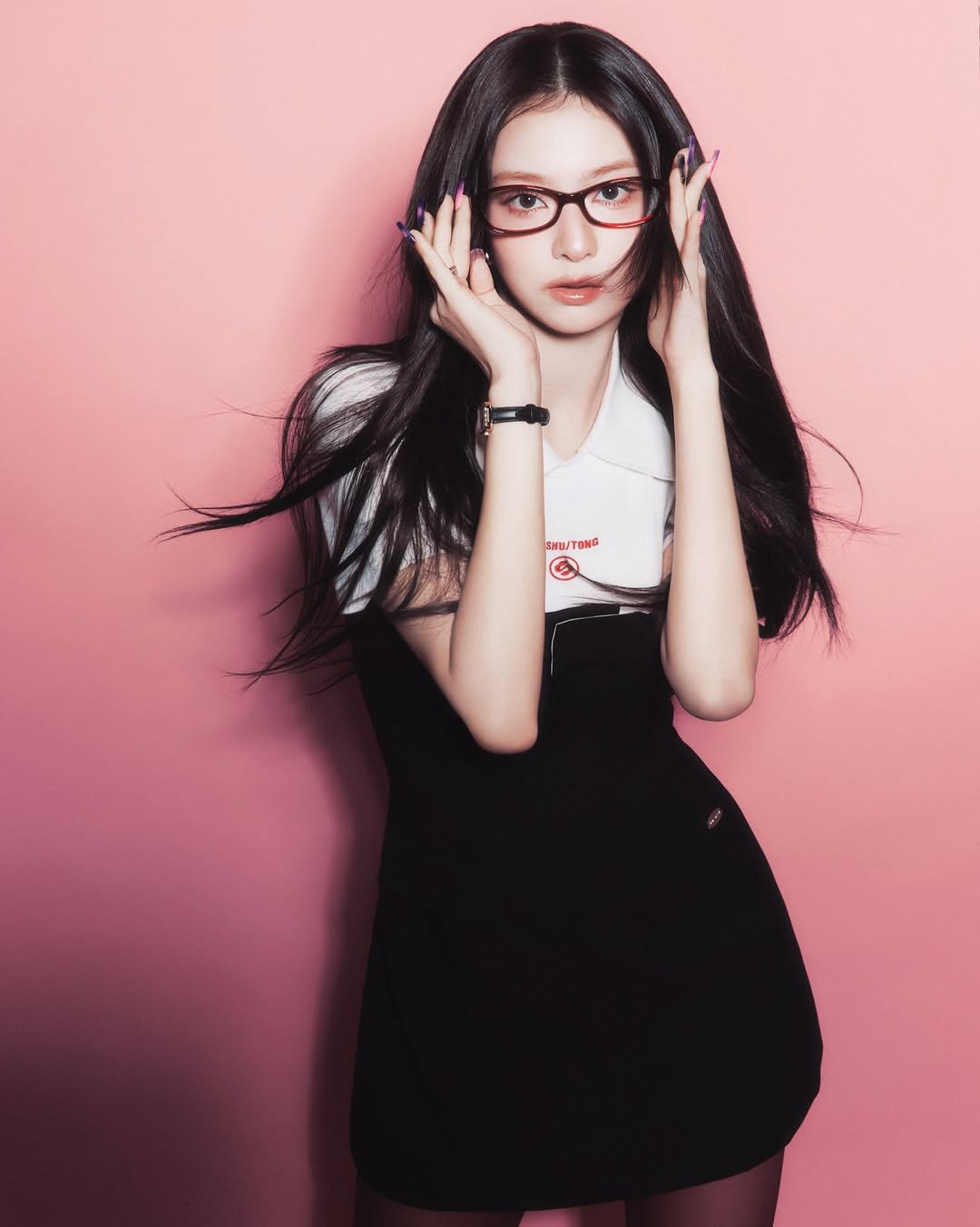 Photo shared by fromis_9 [프로미스나인] on March 26, 2026 tagging @blossomlng_0. May be an image of one or more people, hair, eyeglasses, miniskirt and text.