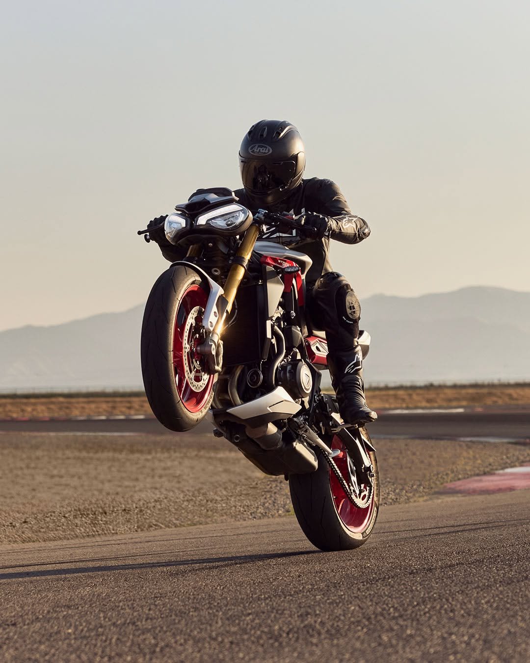 Photo by Triumph Motorcycles on February 10, 2026. May be an image of racing vehicles, motorcycle, dirt bike, helmet and text.