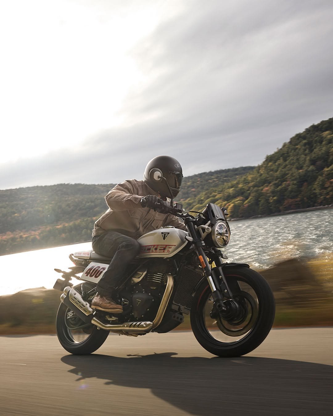 Photo by Triumph Motorcycles on December 19, 2025. May be an image of racing vehicles, motorcycle, helmet and text.