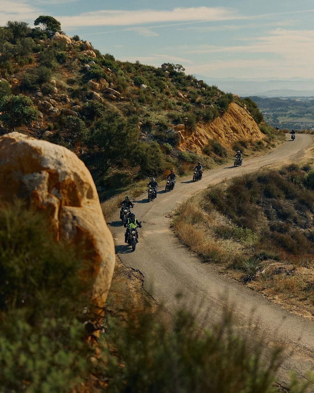 Photo shared by Triumph Motorcycles on December 15, 2025 tagging @johnryanhebert. May be an image of motorcycle, dirt bike, scooter, road and text.