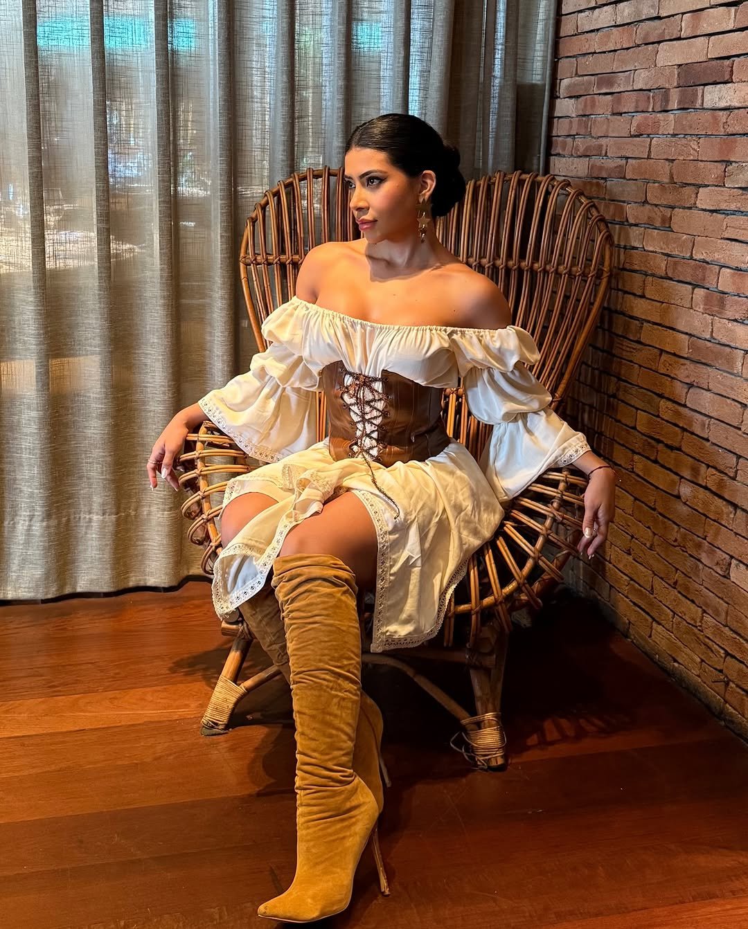 Photo by Ingrid Ohara on December 02, 2025. May be an image of one or more people, makeup, dress and text.