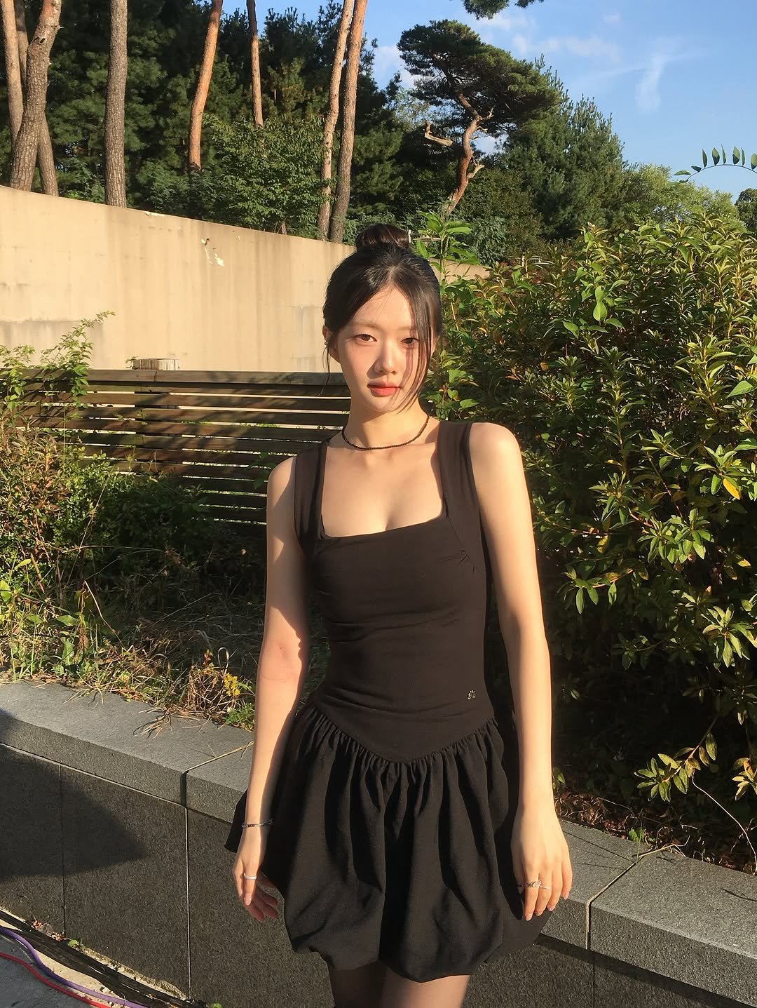 Photo by 오묘 on October 26, 2025. May be an image of miniskirt and text.