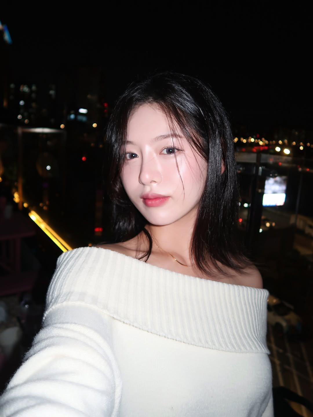 Photo shared by 하늘 민 고울 선 on September 30, 2025 tagging @3ce_official. May be a selfie of 1 person, hair, turtleneck, top, night and text.