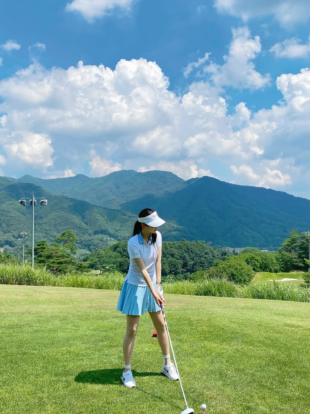 Photo shared by 하늘 민 고울 선 on August 15, 2025 tagging @yamahagolf_korea, and @mipagolfofficial. May be an image of 1 person, golfing, golf course, cloud and text.