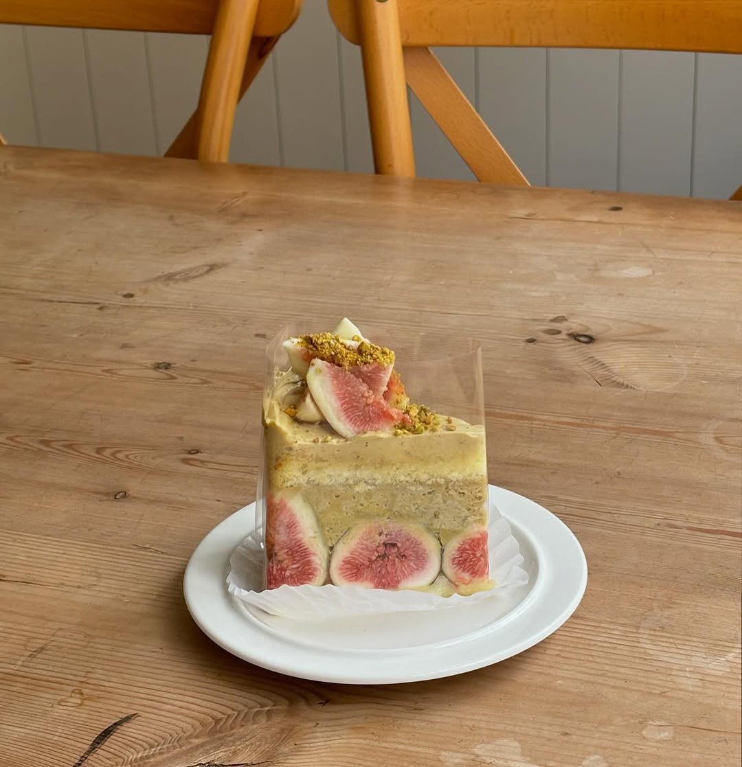 Photo by 리브인오후 on September 24, 2025. May be an image of fig, cake, cheesecake, tart, fruitcake and text.