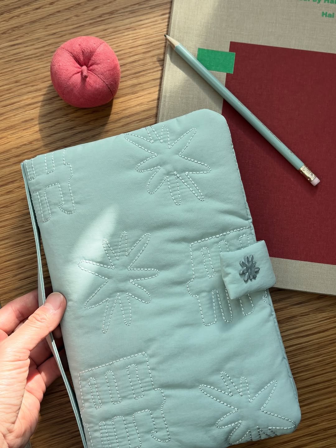 Photo by 오이뮤 / OIMU® on February 18, 2026. May be an image of diary, saddle-stitched leather, book, placemat, potholder, napkin, pencil case and text.
