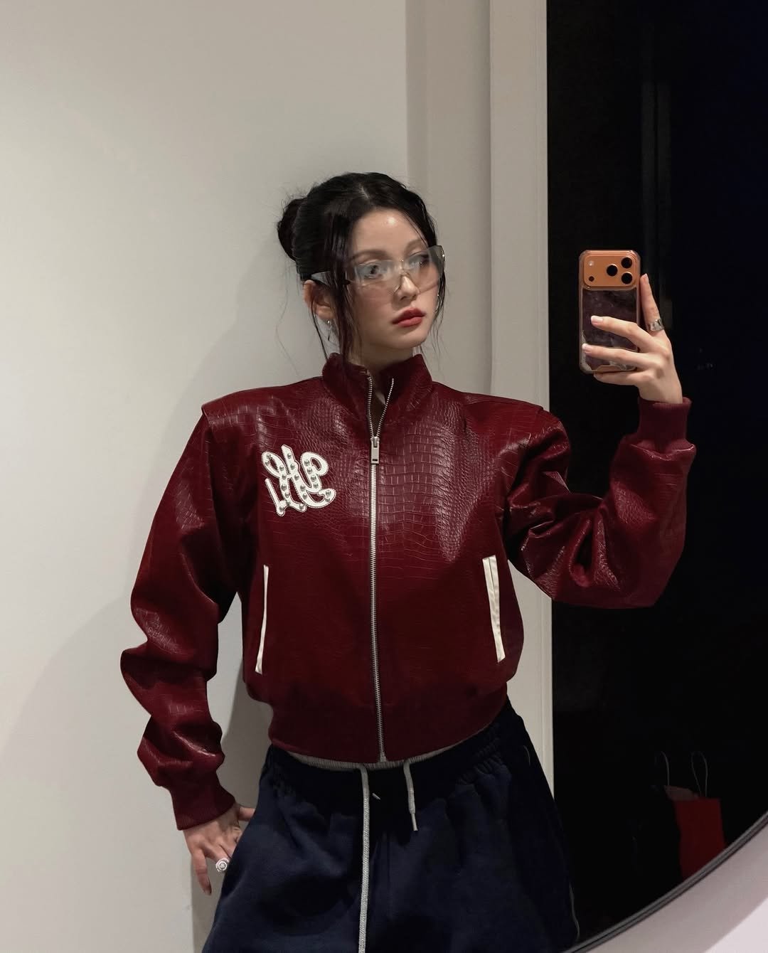 Photo shared by 옥세희✨ on December 28, 2025 tagging @y.e.e.l. May be an image of flight jacket, sweatshirt, sweatsuit, sweatpants and text.