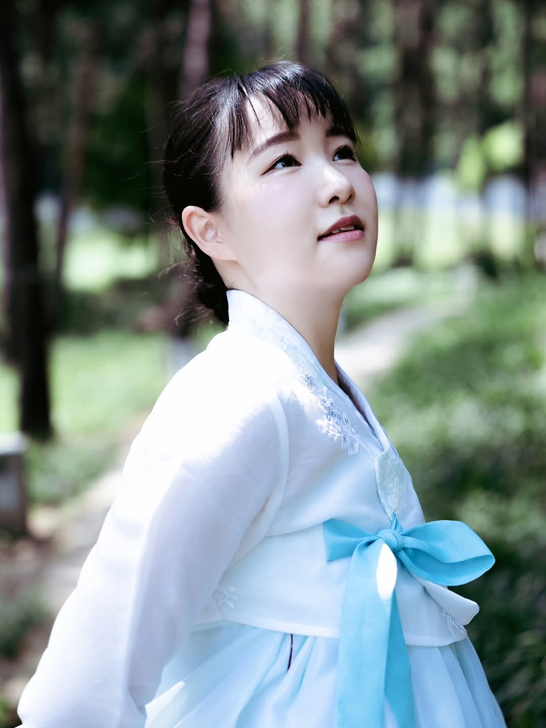 Photo shared by 🦋Minji Kim (Minhwa)🦋 on March 13, 2026 tagging @goiphotography. May be an image of one or more people, hair, outdoors and text.