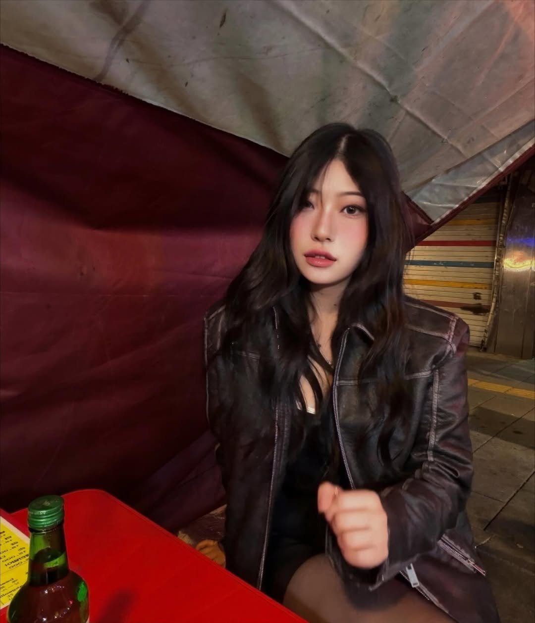 Photo shared by 성 연 on October 25, 2025 tagging @palejade.shop. May be an image of one or more people, hair, beer, jacket, cigarette and text.