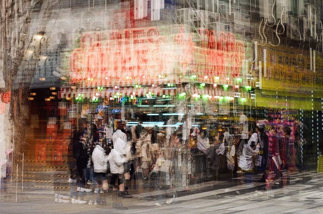 Photo shared by 백 on March 28, 2026 tagging @oldiestaco. May be an image of one or more people, umbrella, street, Tokyo Tower, Times Square, crowd and text.