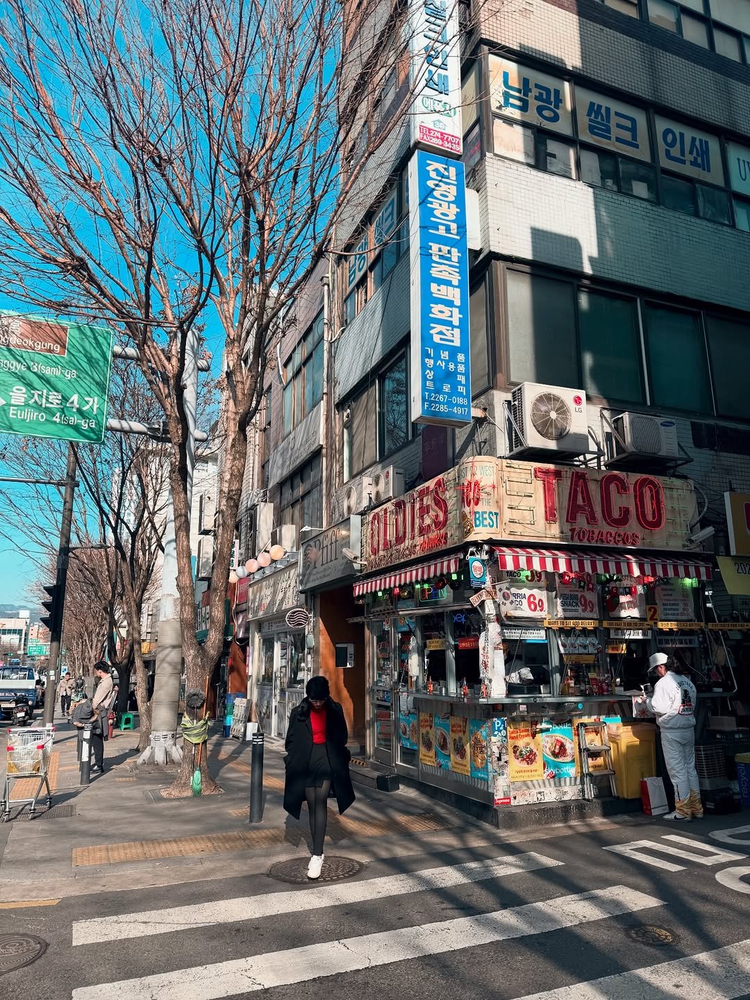 Photo shared by meraki on April 06, 2026 tagging @oldiestaco. May be an image of one or more people, signboard, street and text.