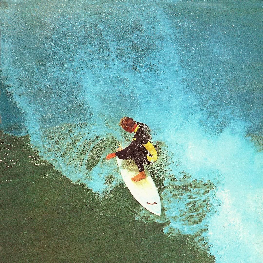 Photo by Aloha in South Island, New Zealand. May be an image of surfboard, wetsuit, water and text.