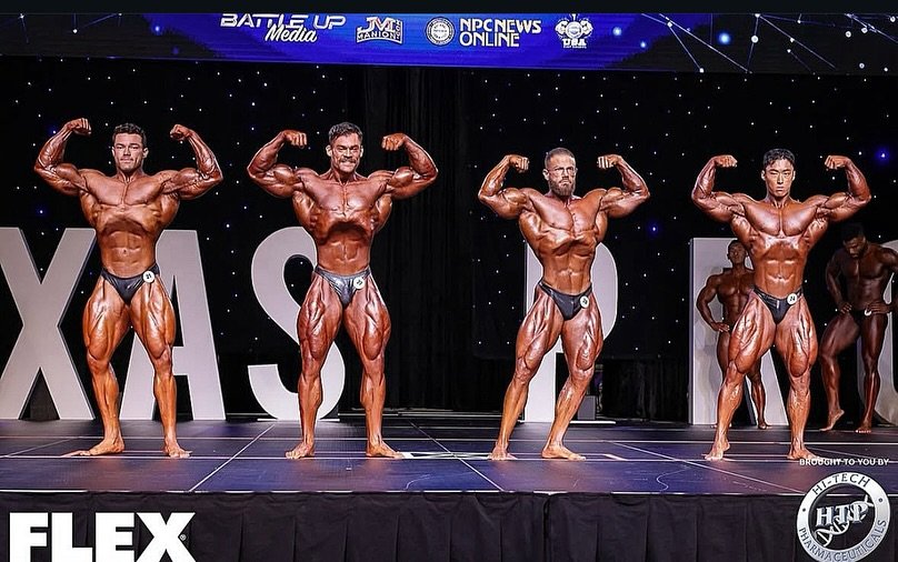 Photo shared by 🌐IFBB PRO 서주성 [FORD GYM] on August 11, 2025 tagging @carlosdommar, @menegatepro, and @battleupproductions. May be an image of 1 person, biceps, body building and text.