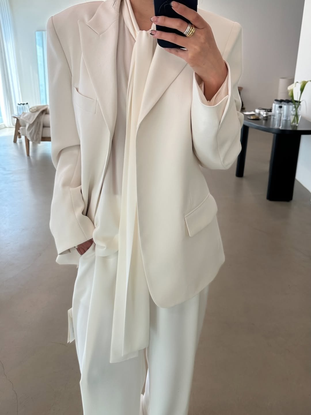 Photo by 오늘영 on March 30, 2026. May be an image of blazer, coat, suit and text.