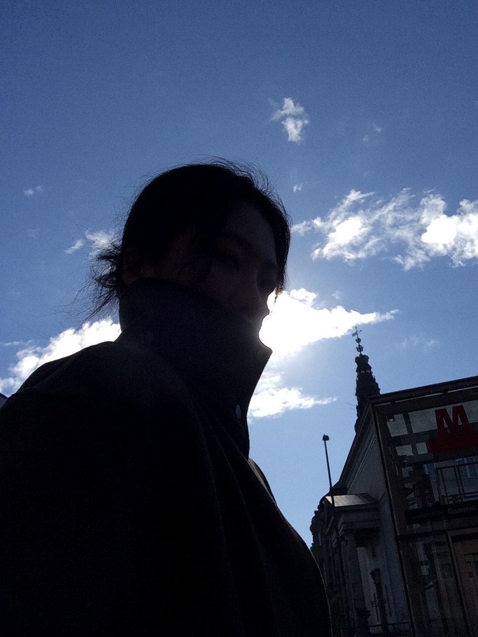 Photo by 오늘영 on September 27, 2025. May be an image of 1 person, duffle coat, overcoat, parka, face mask, cloud and text.