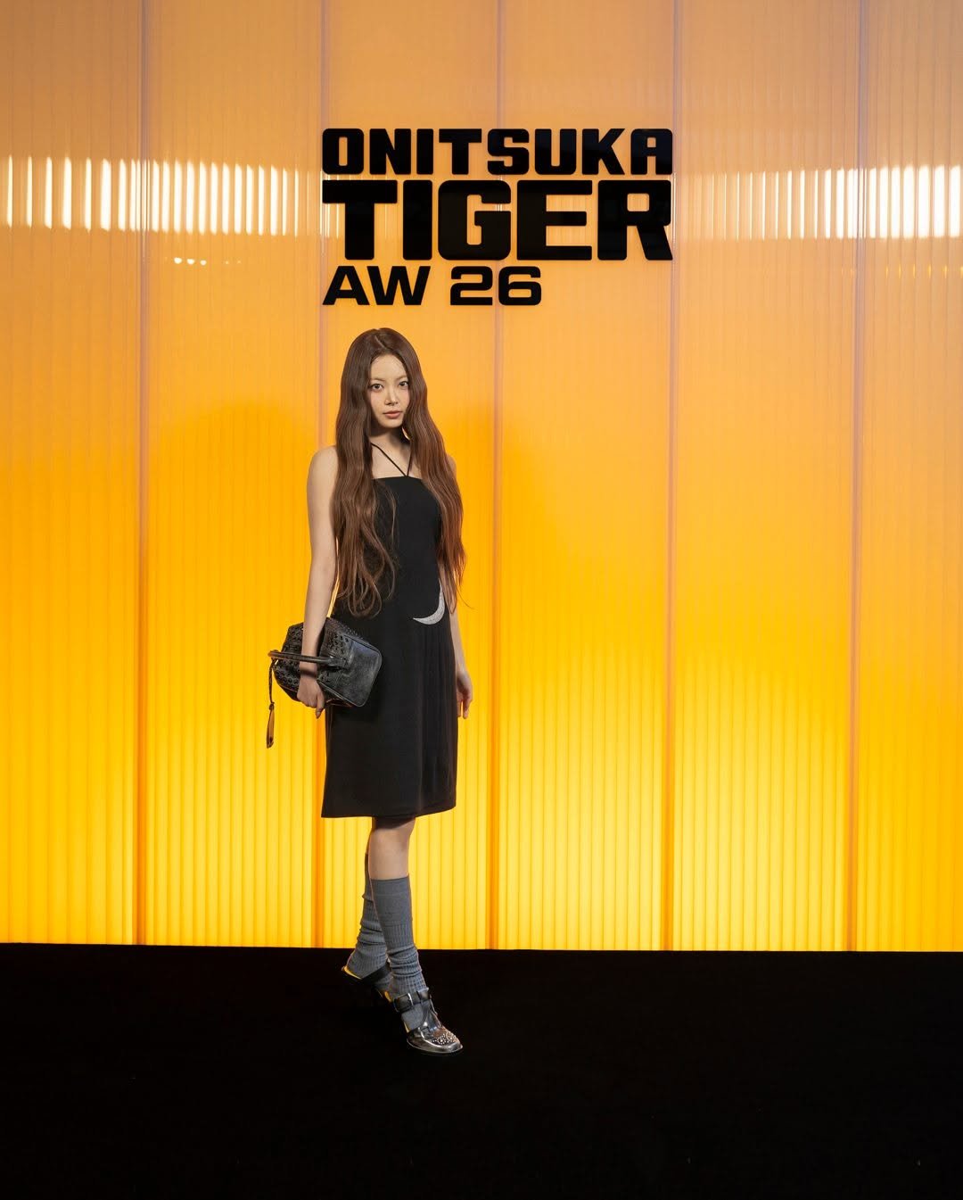 Photo shared by Onitsuka Tiger Korea on February 26, 2026 tagging @hhh.e_c.v. May be an image of poster and text that says 'ONITSUKA TIGER AW 26'.