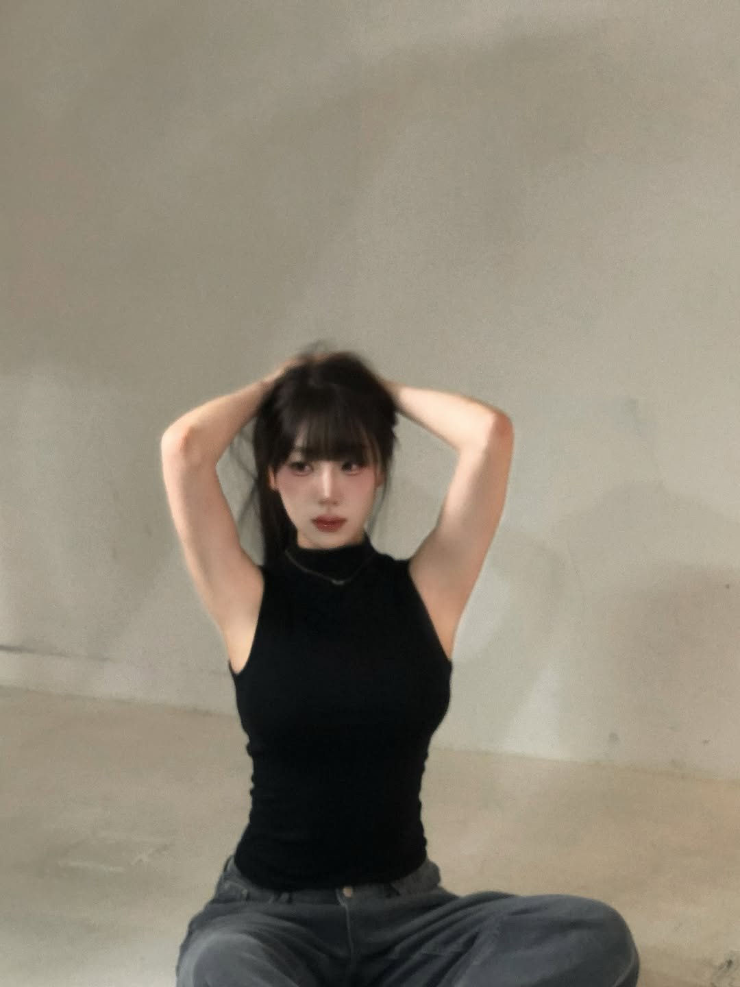 Photo by 장진원 JINWON on March 13, 2026. May be an image of one or more people, bangs, turtleneck, top and text.