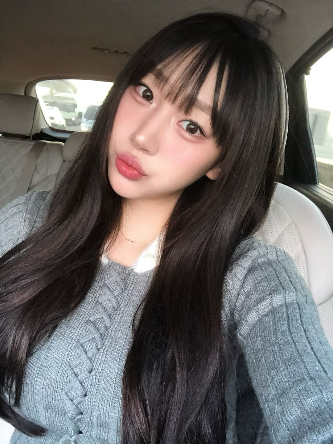 Photo by 장진원 JINWON on February 15, 2026. May be a selfie of one or more people, bangs, lipstick, long hair and text.