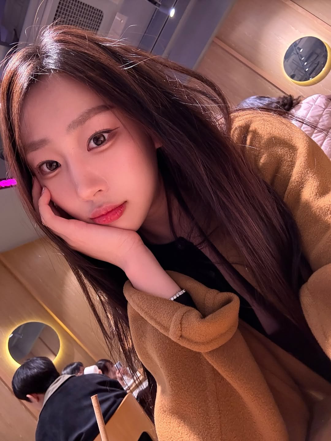 Photo by 장진원 JINWON on November 15, 2025. May be an image of one or more people, hair, duffle coat, parka and text.