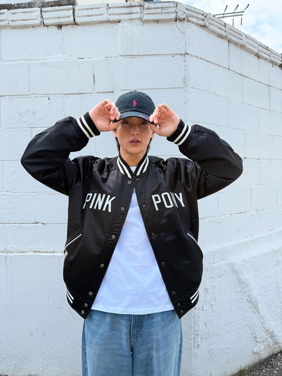 Photo shared by Mark on October 04, 2025 tagging @poloralphlauren. May be an image of 1 person, duffle coat, hat, flight jacket, parka, sweatpants, sportswear and text.