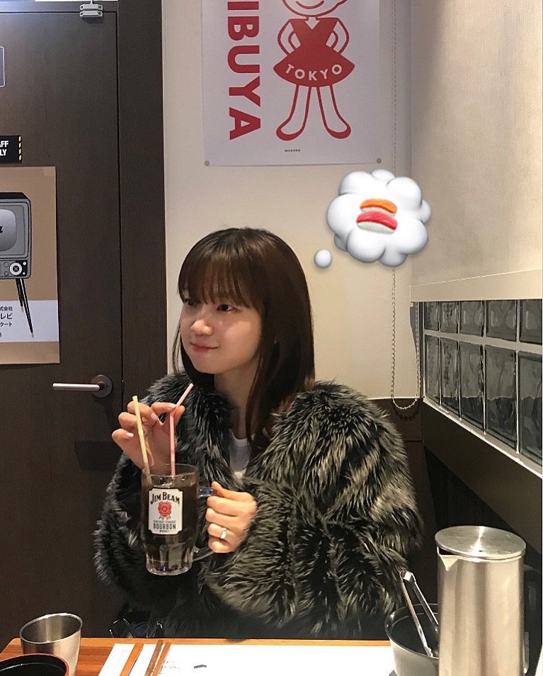 Photo by 오제 on January 28, 2026. May be an image of one or more people, hair, drink, parka and text.