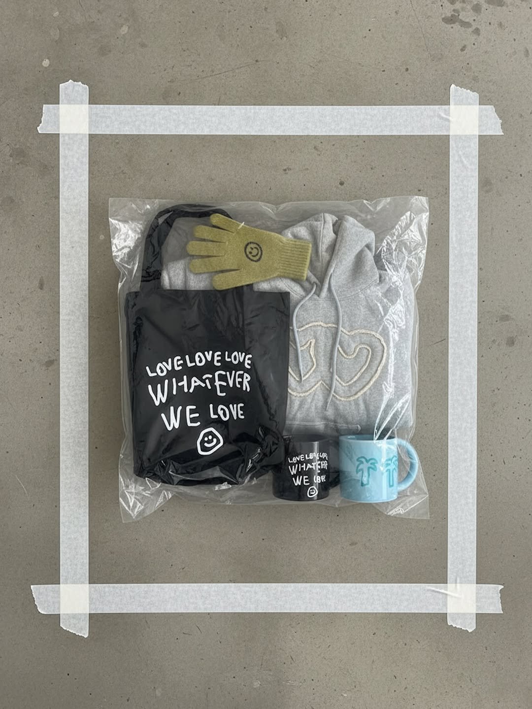 Photo by ooowl on December 11, 2025. May be an image of tool bag, face mask, sweat band and text that says 'LOVELOVEL LOVELOVELOVE LOVE LOVE WHATEVER WE WELOV LOVE LOVELEYEUR LOVE か年場 WHNT WEBE BE WE e 干神 ት'.