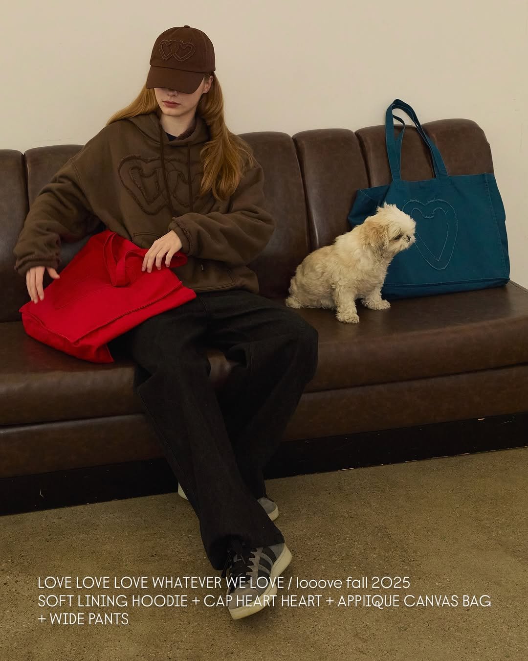 Photo by ooowl on September 26, 2025. May be an image of 1 person, duffle coat, purse, fur, sling and text that says 'LOVE LOVE LOVE WHATEVER WE LOVE /looove fall 2025 SOFT LINING HOODIE CAP HEART HEART APPIIQUE CANVAS BAG + WIDE PANTS'.