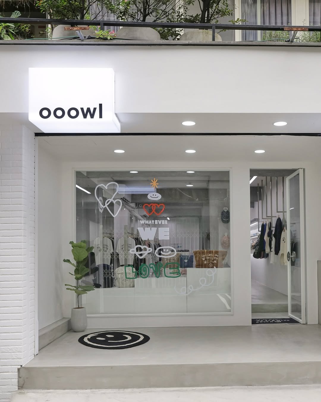 Photo shared by ooowl on December 14, 2025 tagging @ooowl.tw. May be an image of display case, clothes hanger, signboard and text.