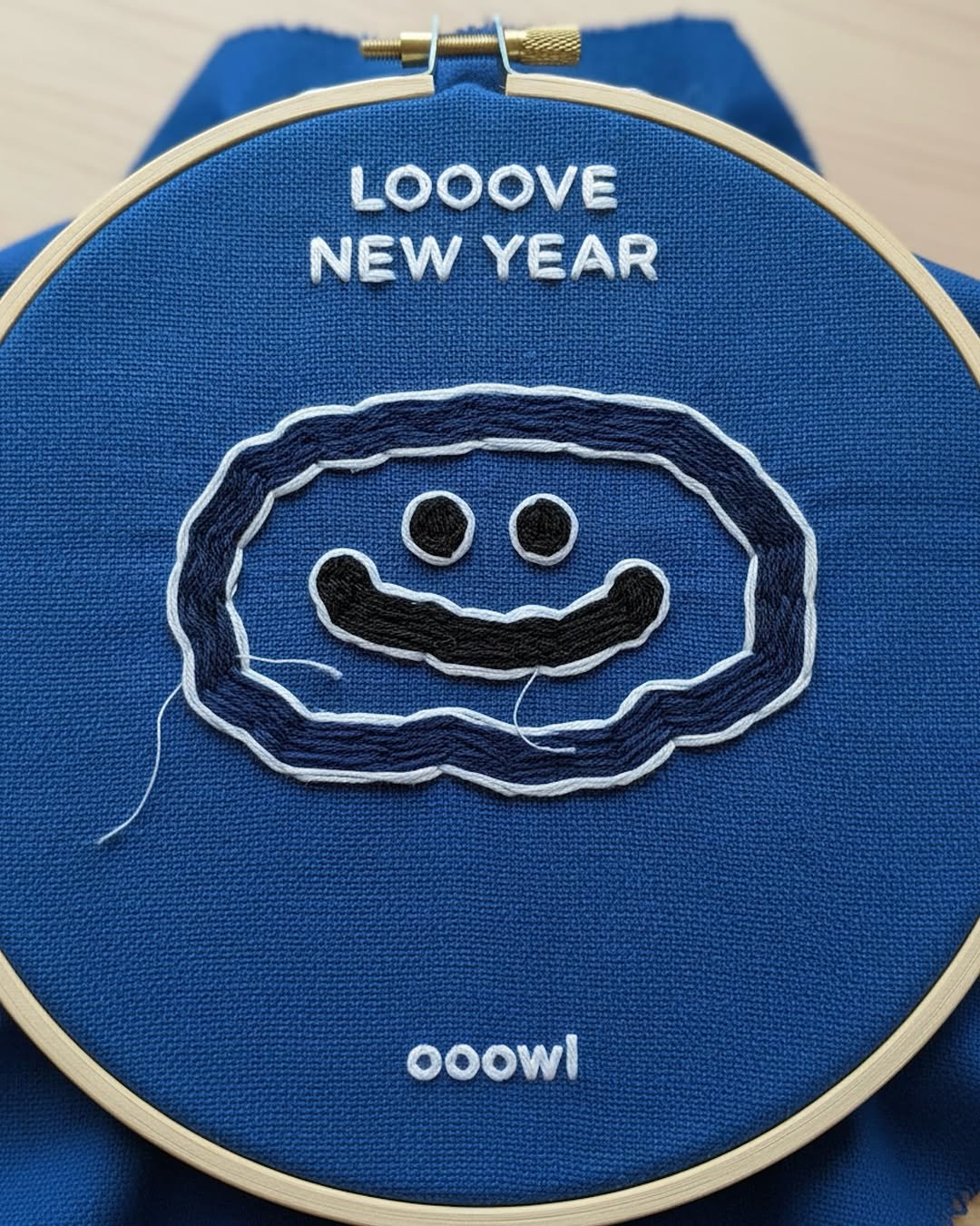 Photo by ooowl on December 30, 2025. May be an image of stitching and text that says 'a LOOOVE NEW YEAR ooowl'.