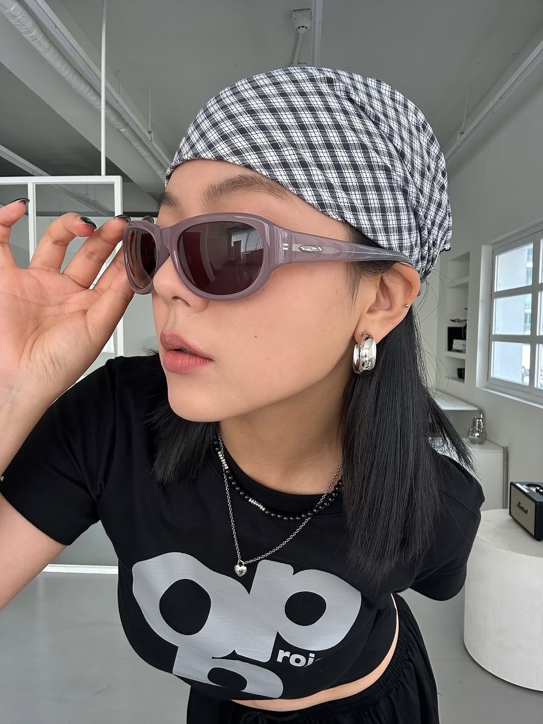 Photo by Opening Project on August 22, 2025. May be an image of 1 person, glasses, bandanna, headscarf, checker board, beret, turban, sunglasses and text.